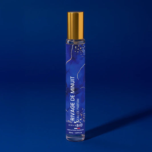 Flacon 30ml de l'Eau de Parfum Rivage de Minuit par Born to Bio. Senteur élégante, boisée et florale sur un fond bleu nuit. Fabriqué en France.