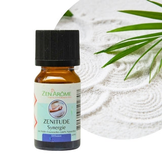 Flacon de 10 ml de synergie d'huiles essentielles Zenitude de Zen'Arôme sur un fond de sable de jardin zen, boutique KAVERN.